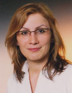 Dr. med. E. Berisha